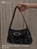 Oval buckle shoulder bag