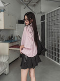 String striped over short-sleeved shirt