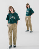 Deep tuck loose fit tapered banding pants