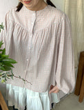 Near round shirring check blouse