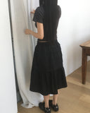 Mire cut tiered midi skirt