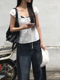Noal Lace Ribbon Puff Sleeveless Blouse