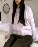 Neha loose wool round neck cable knit