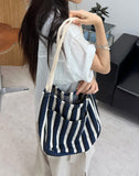 Penan striped shoulder bag