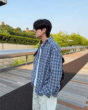 curd over check shirt