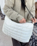 Reven padded crossbody bag