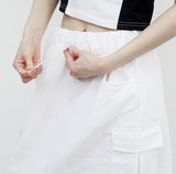 Poron string back slit pocket skirt