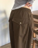 Sando back pocket hem snap pin tuck cotton pants