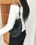 Quone half-moon leather shoulder bag