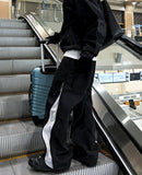 Oblique side zipper nylon pants
