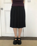 Nuen Pleated Midi Skirt