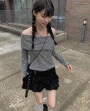 Reno Tiered Pleated Punching Mini Skirt