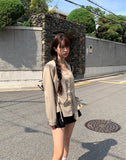 [Muffler set] Ir bean button side strap V-neck long sleeve blouse