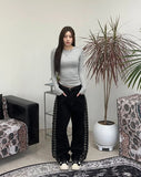 Heron embroidered denim pants