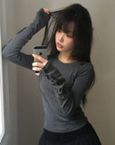 Juen Shoulder Slit Button Long Sleeve T-shirt