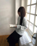Neha loose wool round neck cable knit