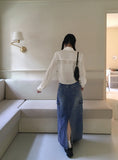 Pluck cut cargo pocket back band slit denim long skirt
