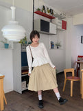Nekomi Pleated Midi Skirt