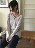 Belky half button henley neck boucle long sleeve knit