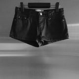 Reco coated leather shorts