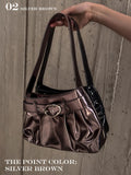 Oval buckle shoulder bag