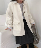 Tundro pintuck wool midi skirt