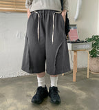 Neraki Incised Strap Bermuda Sweatpants