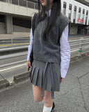 Dachi belted mini pleated skirt