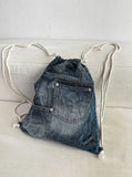 Rip denim pants bag