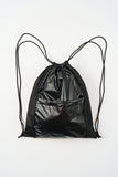 Metallic panel drawstring backpack