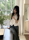 Coffin punched lace string sleeveless blouse
