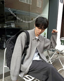 Minimal achromatic two-way cardigan