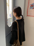 Cotina V-neck Slit Cable Knit