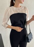 Niaki see-through color matching three quarter length blouse