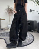 Pale studded strap pants