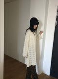 [MADE] Flute Ribbon Strap Punching Waves Knit One Piece