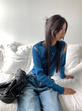 Cordill ribbed color matching shoulder slit cropped long sleeve knit