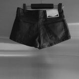 Reco coated leather shorts