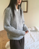 Gicle loose fit half zip-up boucle knit