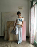 Niku Stripe Frill Banding Wide Pants