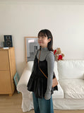 Chomin nylon back ribbon sleeveless blouse