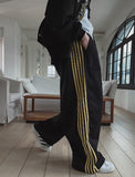 Solid track line two way training pants