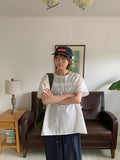 Cube Ribbon Cut Shirring Short Sleeve Blouse