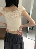 Illum Embroidery Punching Slit Cropped Short Sleeve Blouse