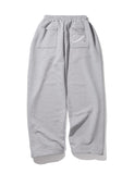 UNMEASURED LOGO TWO TUCK SWEAT PANTS