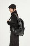 Casual metal glossy backpack