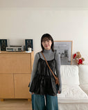 Chomin nylon back ribbon sleeveless blouse