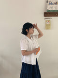 Belbo pin tuck button short sleeve blouse