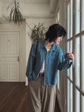 Leroy cutting denim shirt
