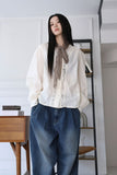 Wave shirring muffler